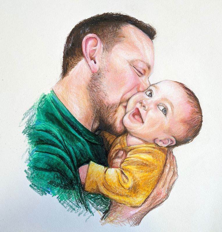 dad kissing baby